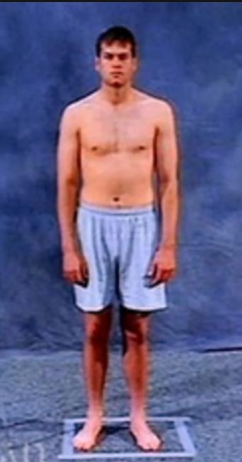 Tom Brady at the combine with decidedly not megashoulders.