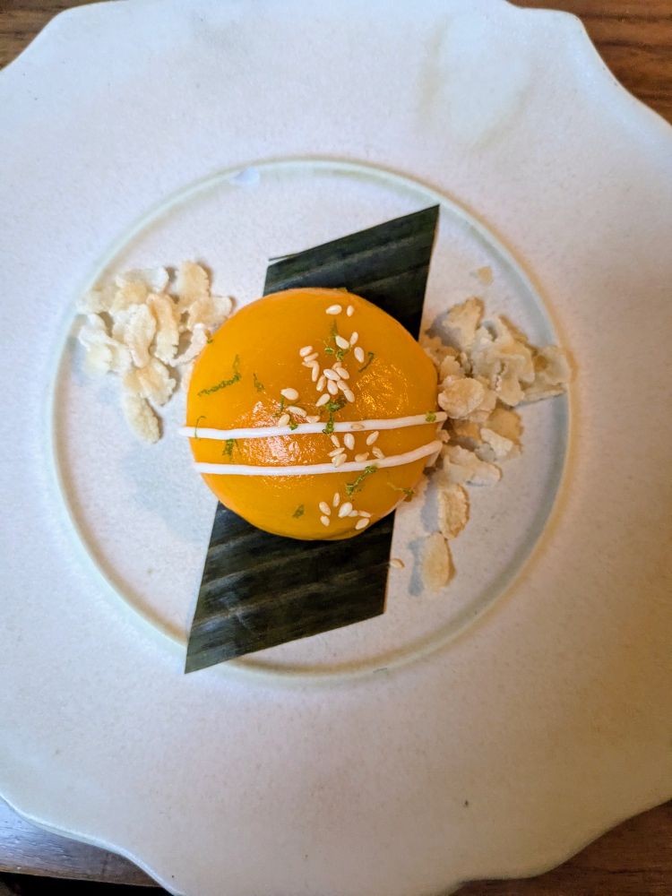 Small orange circle shaped dessert 