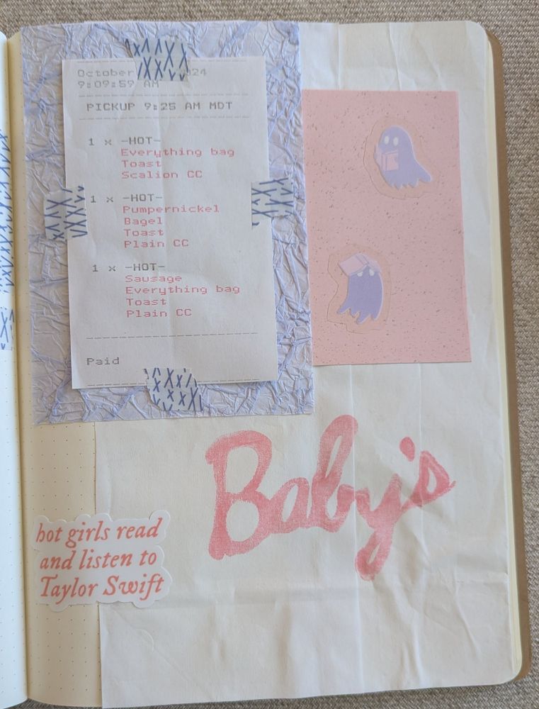 A journal page with a white paper bag that says "Baby's", a sticker that says "hot girls read and listen to Taylor Swift, a pink scrap of paper with lavender stickers that are ghosts with books, and a piece of textures lavender paper with a receipt from a bagel purchase taped on it.