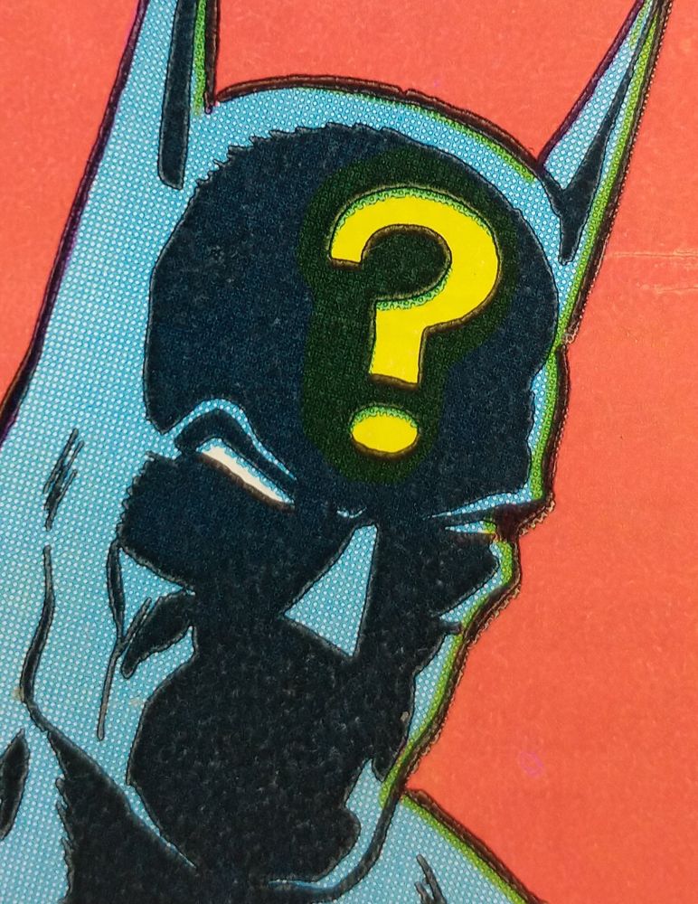 Batman got a big question mark on his head 