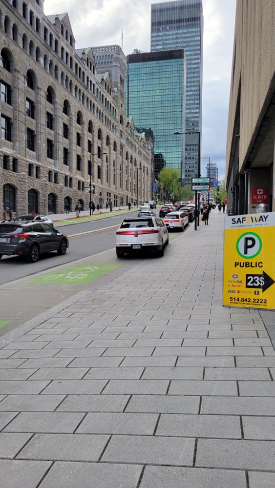 A line of limos blocking the Peel Street bike lanes in Montreal beside a hotel.

There is parking around just the corner in front of the hotel, on the street behind the hotel, and there are signs for *three* nearby parking garages visible in the photo.