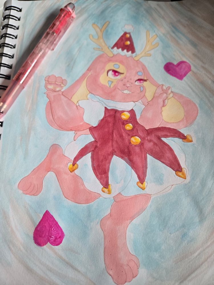 A Jackelope clown surrounded by hearts