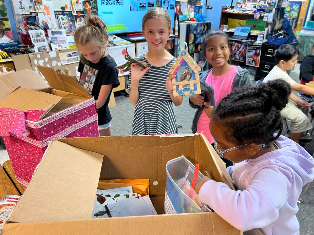 Students unpack the boxes 