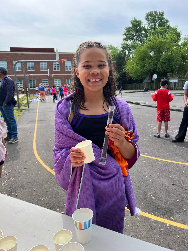 Student w water and popsicle 