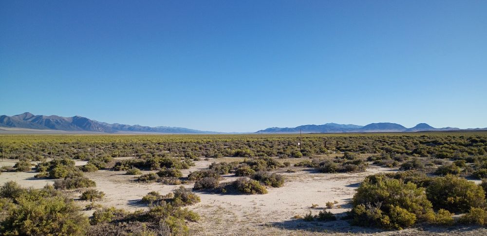 Photo from the middle of nowhere, Nevada. I know many find it ugly, but I absolutely love this landscape; I find the isolation and the desolation to be soul-enriching. It's been a long time since I've seen it. 