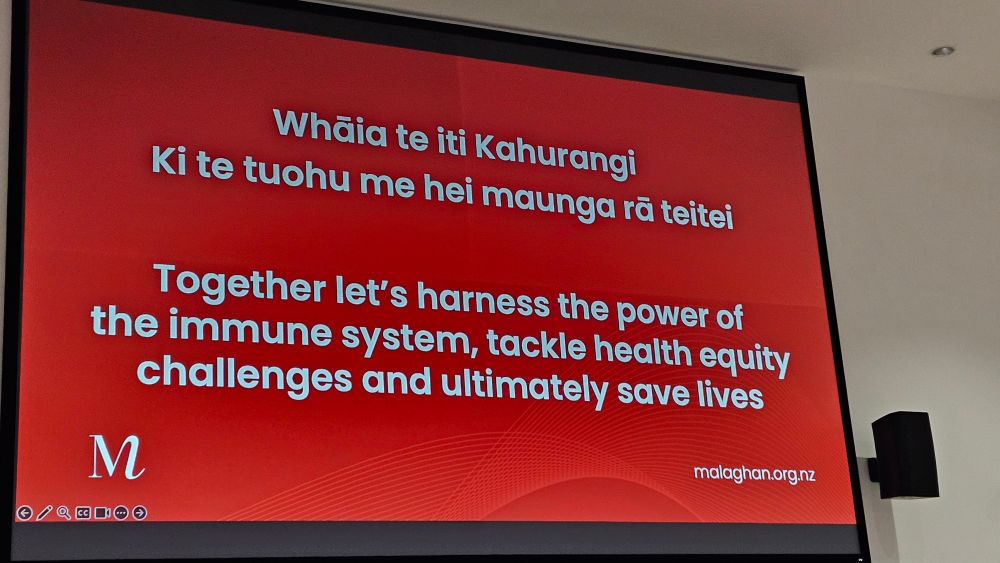 Closing slide from the presentation with text in Māori (top) and with English translation below: Together let's harness the power of the immune system, tackle health equity challenges and ultimately save lives.