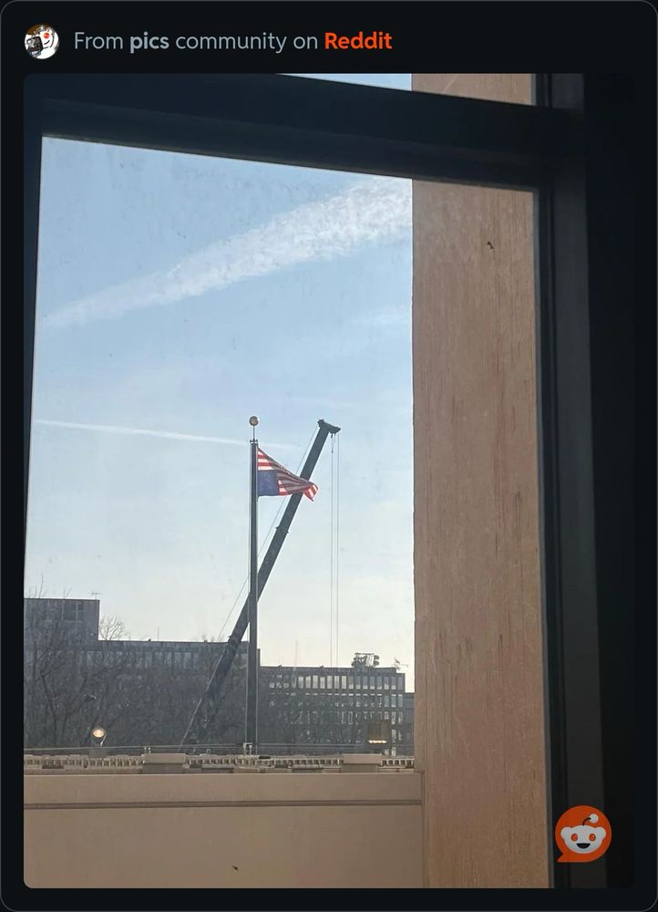 American flag raised upside down outside the State Department.