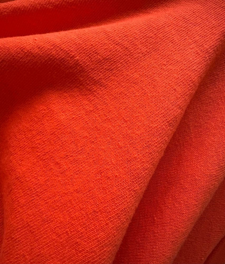 Orang fabric covering the whole space.