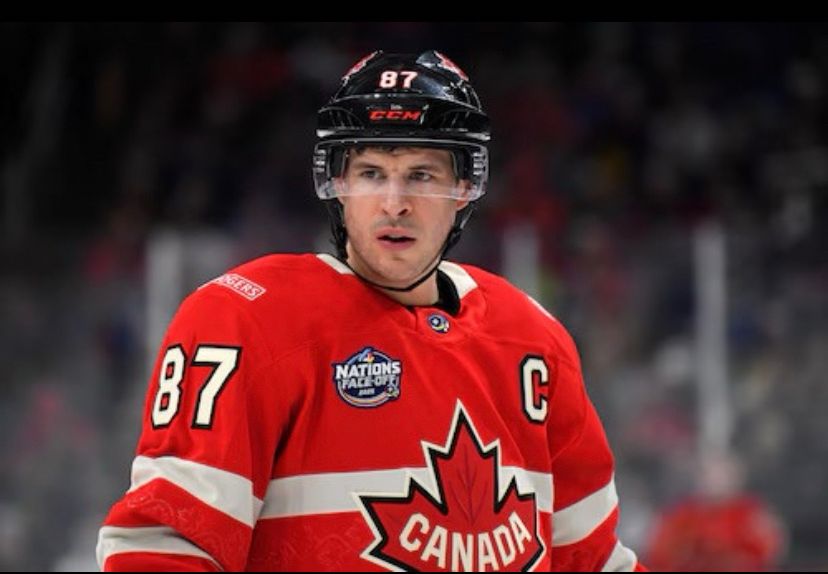 Sidney Crosby wearing team Canada four nations jersey and helmet. 