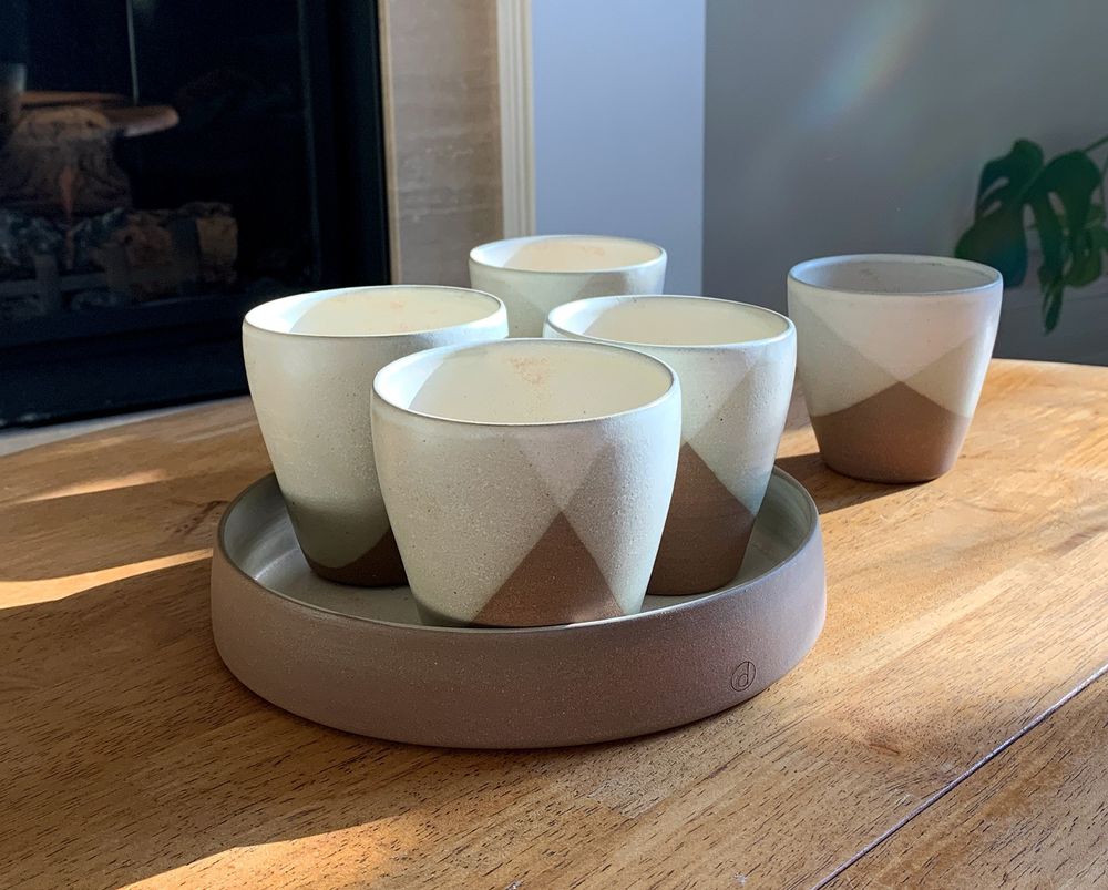 Tumblers made with terracotta clay with a pale glaze (Rutile).