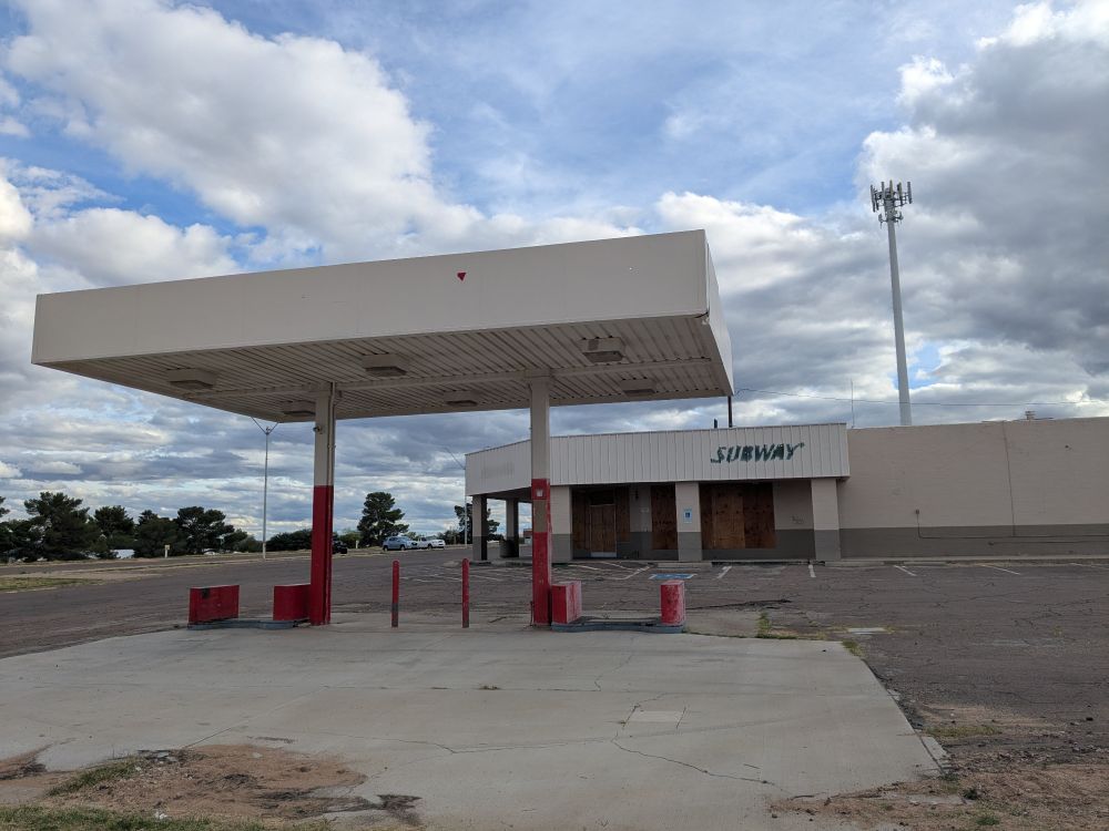 No, it really is. This is the abandoned gas station and the abandoned Subway in the abandoned mining town when I live. I walked about 50 feet out of my house to take this picture. But the cell tower is actually how my data reaches the Internet.