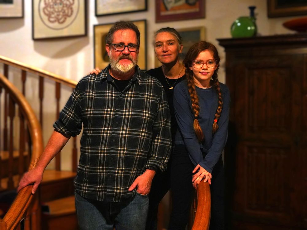 A father, mother, and daughter inside their Capitol Hill home in a historic district in Washington, DC.