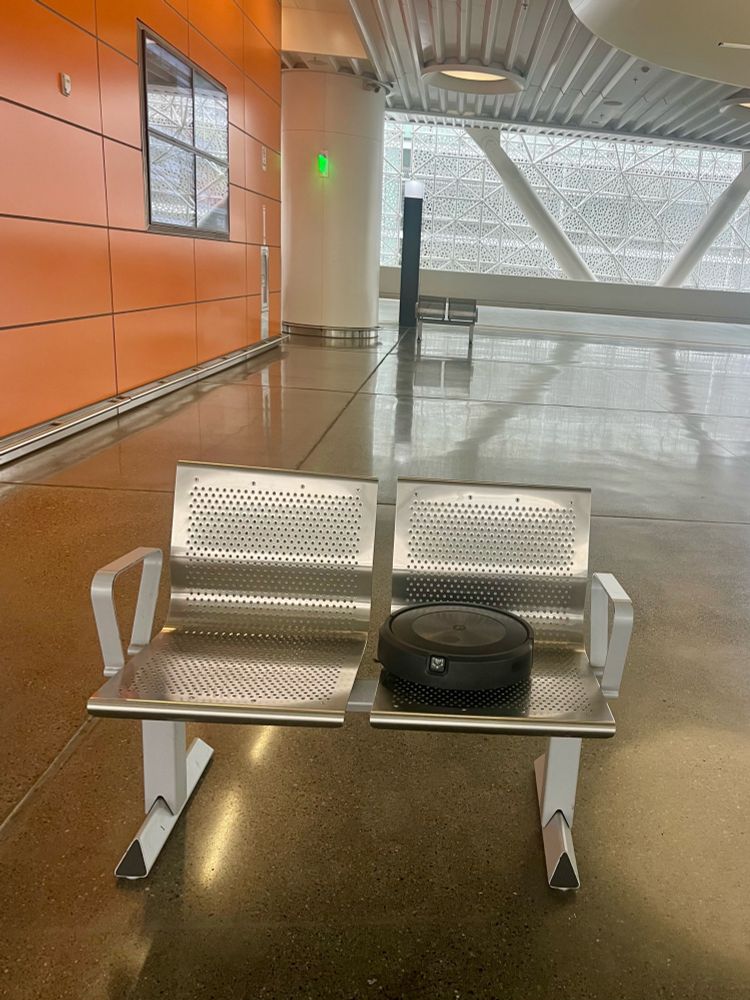 a roomba on a bench at Salesforce Transit Center in San Francisco 