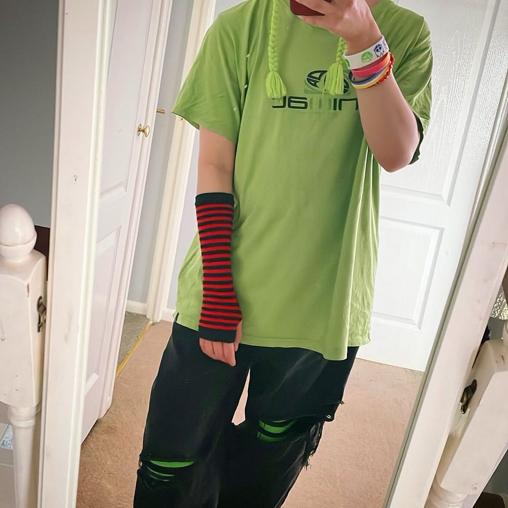Me in a line green shirt, ripped black jeans and a gir from invader zim beanie