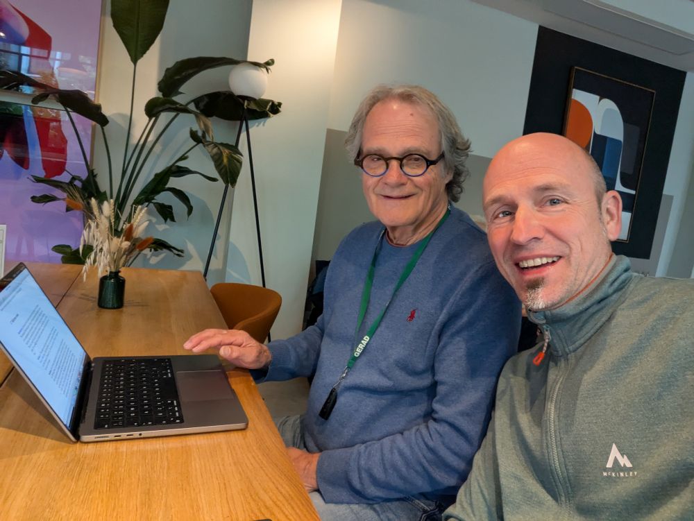 Jacques Desrosiers and myself, sitting in front of our computers 