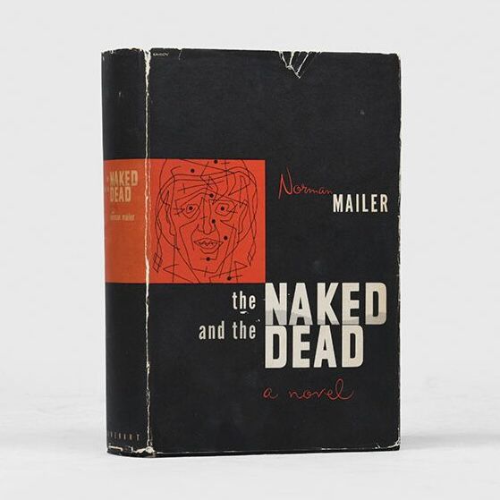 Alt text:

“First edition book cover of The Naked and the Dead by Norman Mailer. The design features a black background with a red square on the left containing an abstract line drawing of a face. The title is printed in bold white and gray text, ‘the NAKED and the DEAD,’ with ‘a novel’ in red script below. The author’s name, Norman Mailer, appears in white and red to the right of the drawing. The cover shows signs of wear along the edges.”