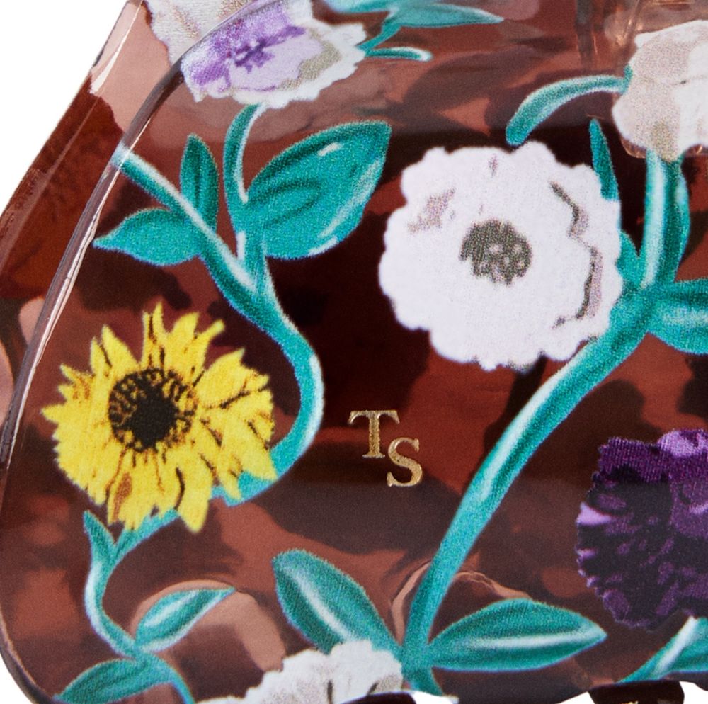 detail on the taylor swift acoustic collection hair clip