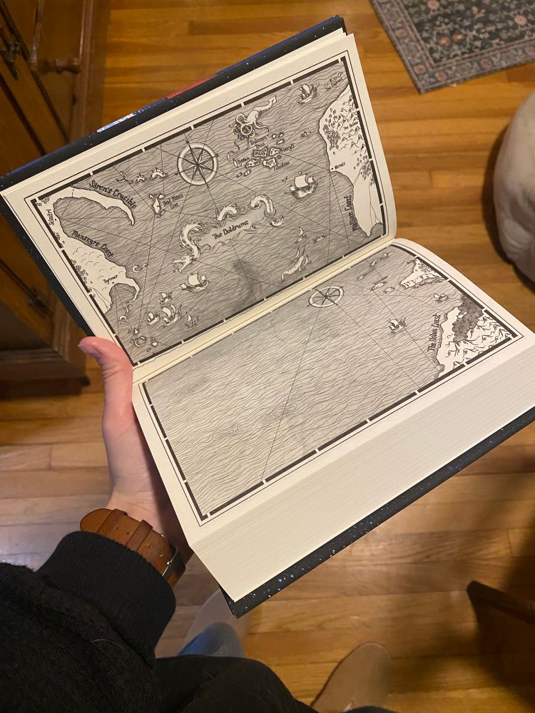 Inside the book! The maps I drew!! Two black and white sea charts depicting all the places the characters visit in the book, with lots of boats and critters scattered throughout 