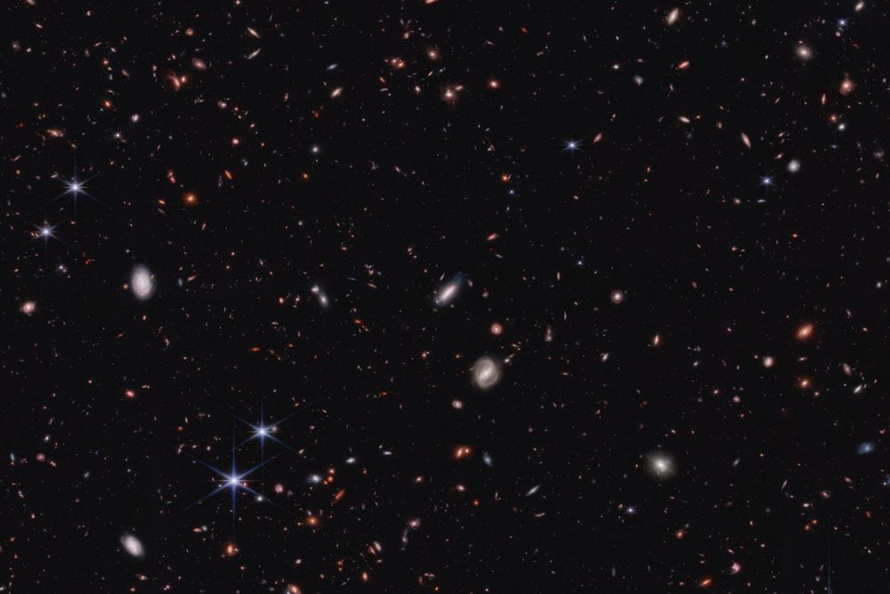 Sky in space filled with stars, galaxies, black holes, and other objects