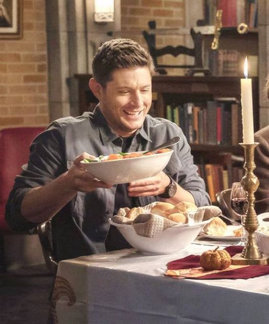 Dean Winchester passing dishes