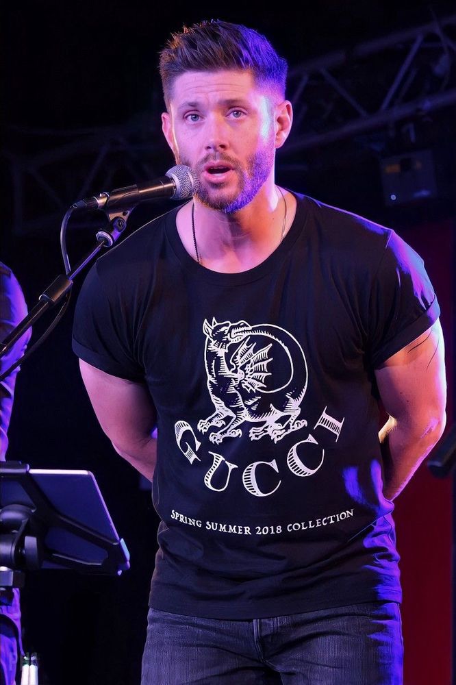 Jensen speaking into a microphone 