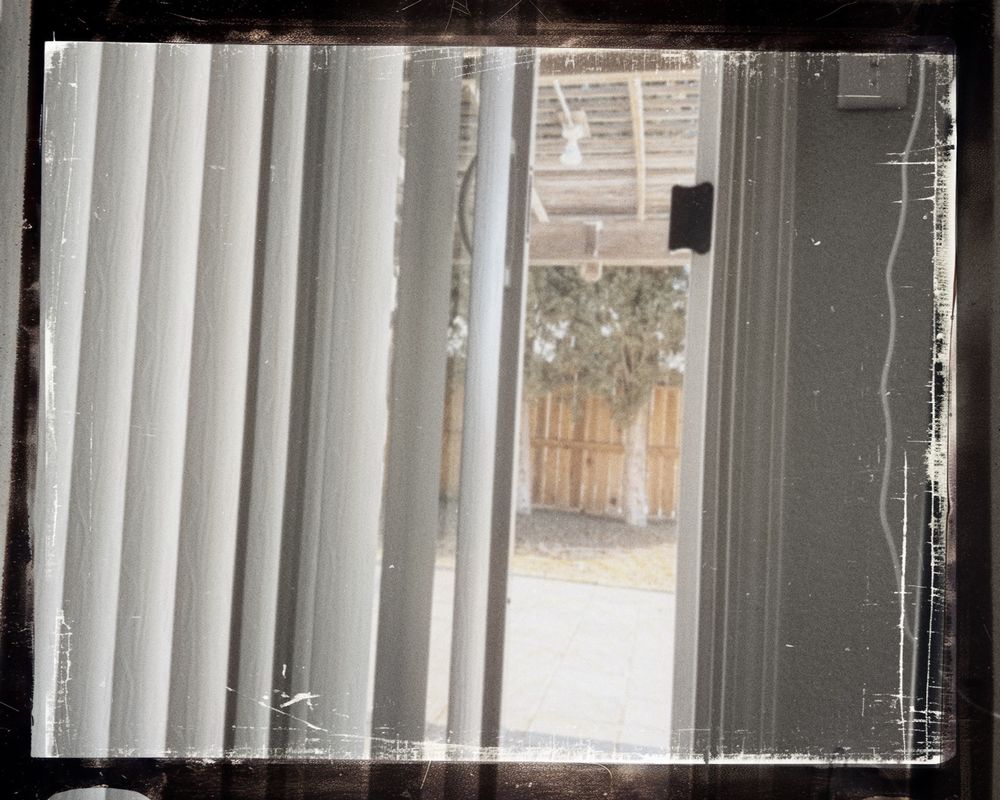 My view right now of the sliding door leading to the backyard