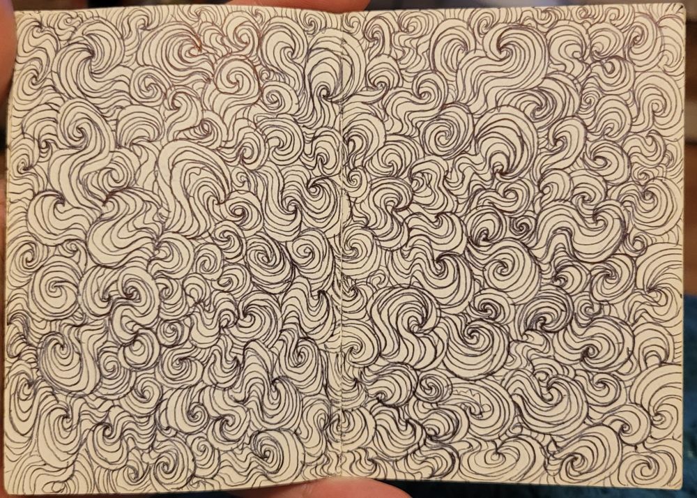 4th double page spread of the A7 sketchbook, no gaps between curls, most are spirals and tight curls.