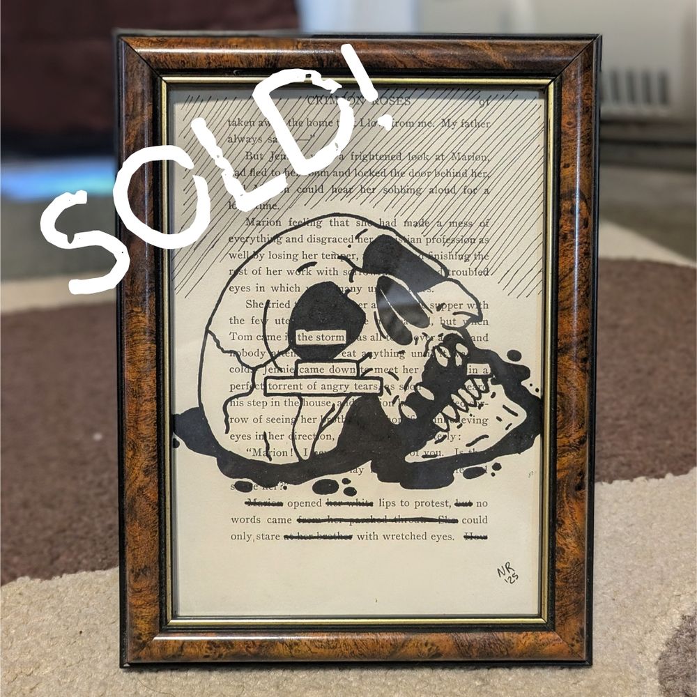 Framed blackout poetry with a hand painted skull featured in the middle. The word "SOLD!" is on the image. Poem reads:

The storm came down
In a torrent of angry tears
Opened lips to protest 
No words came
Could only stare with wretched eyes