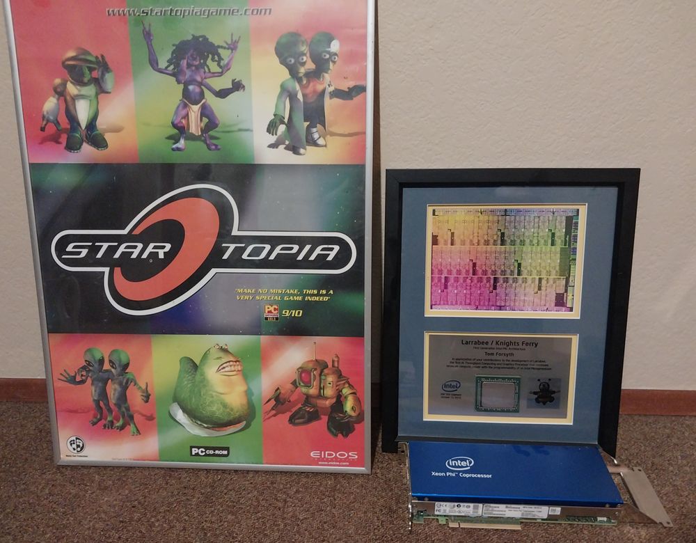 * Poster of StarTopia, taken off the office walls the day Muckyfoot closed.

* A framed die shot and package of Larrabee 1.

* A PCIe videocard with Larrabee 2 in it.