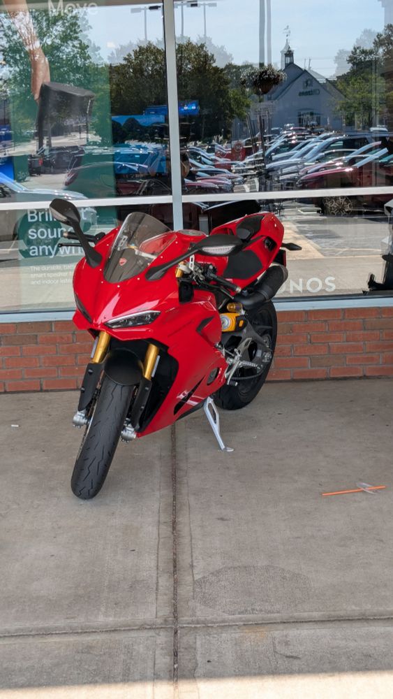 the bike of my dreams, a Ducati Panigale, in their perfect Ducati red with the gorgeous gold accents