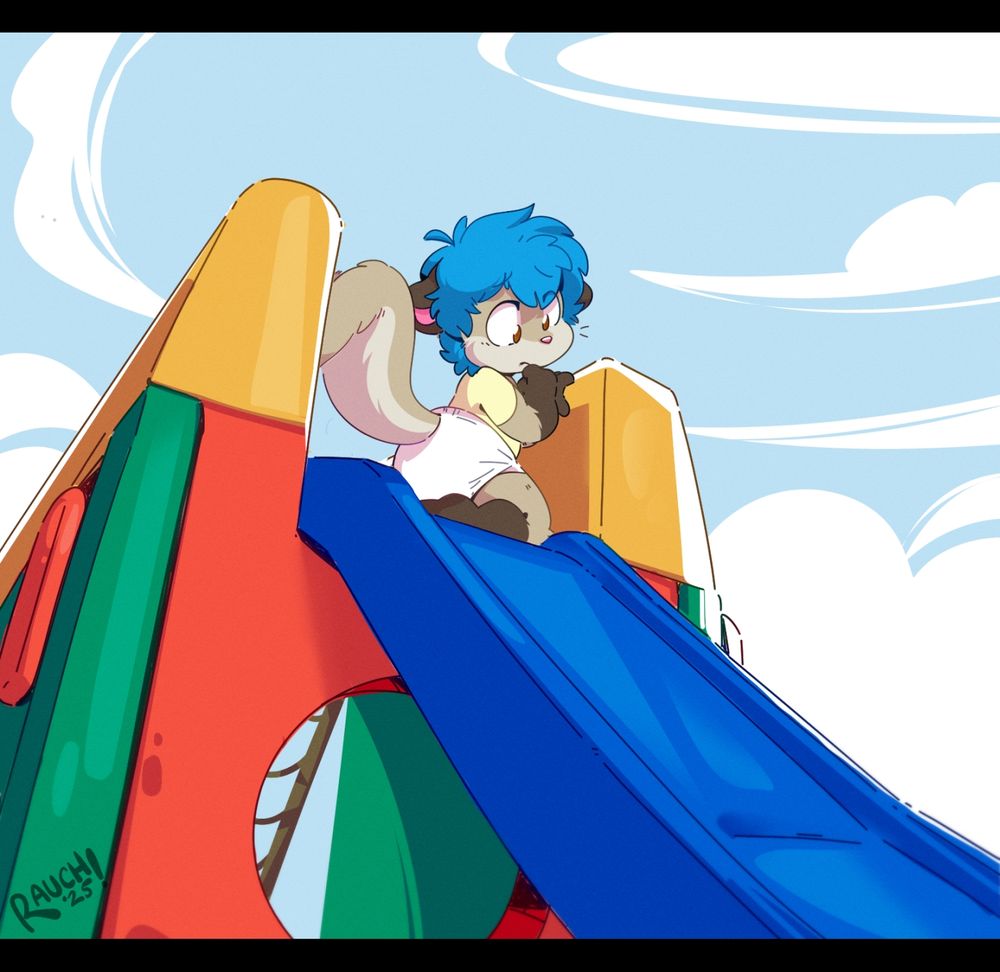 Solomon at the top of a slide and suddenly very wary of going down the slide!