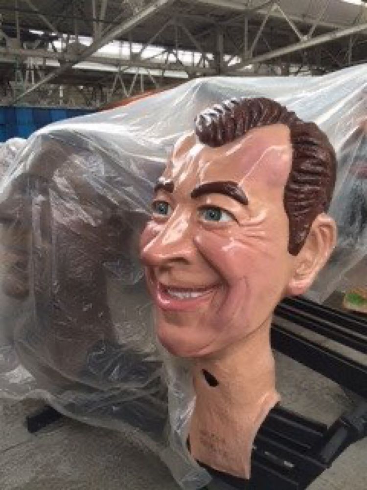 Giant fiberglass head of Walter Reuther, worn at Detroit Thanksgiving Day parades.