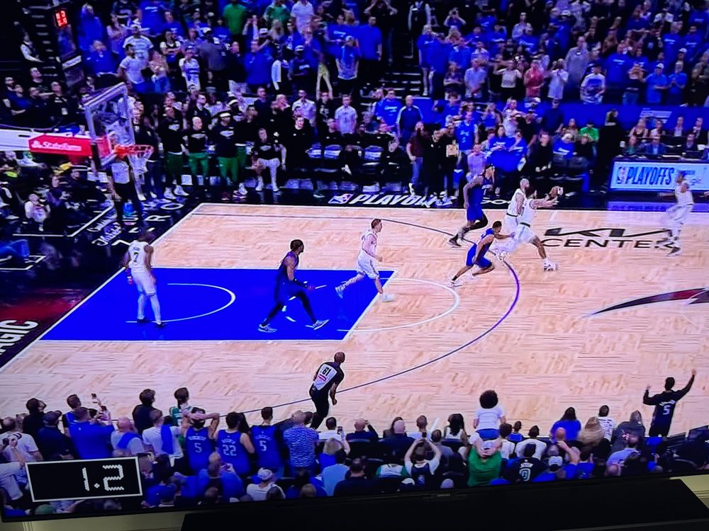 Jayson Tatum getting a rebound with 1.2 seconds on the clock