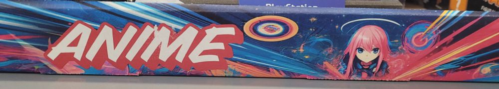 Shot of the front. With "ANIME" written on it. Whether anime is describing the girl, the box itself, or simply yelling into the void, is up for debate.