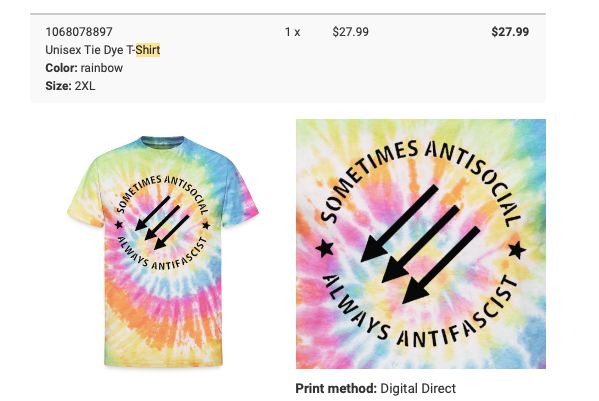 A rainbow shirt with an iron front three arrows, and the words sometimes antisocial, always antifascist 