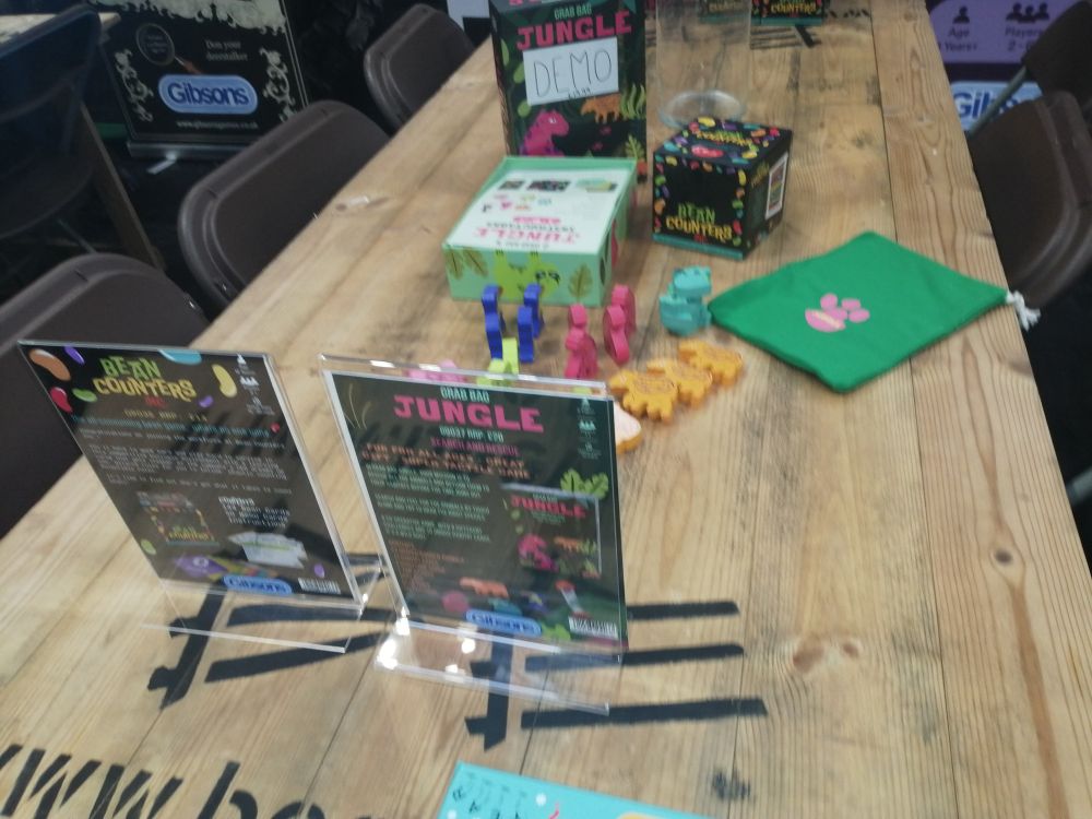 Some board game bits on a wooden table 