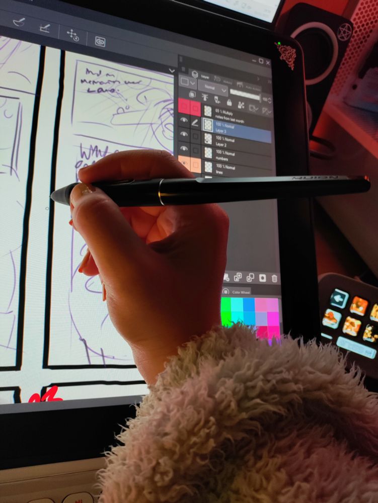 photo of my hand on my tablet screen