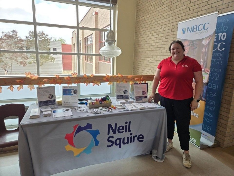 Lianne at the Neil Squire booth.