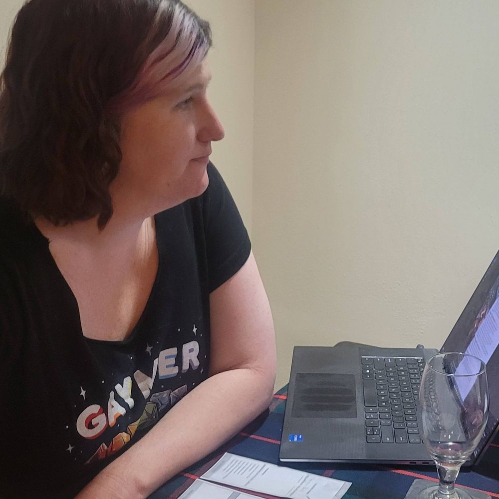 Morgan sits in the GM seat.  She appears to be waiting for the players to narrate their next action.  