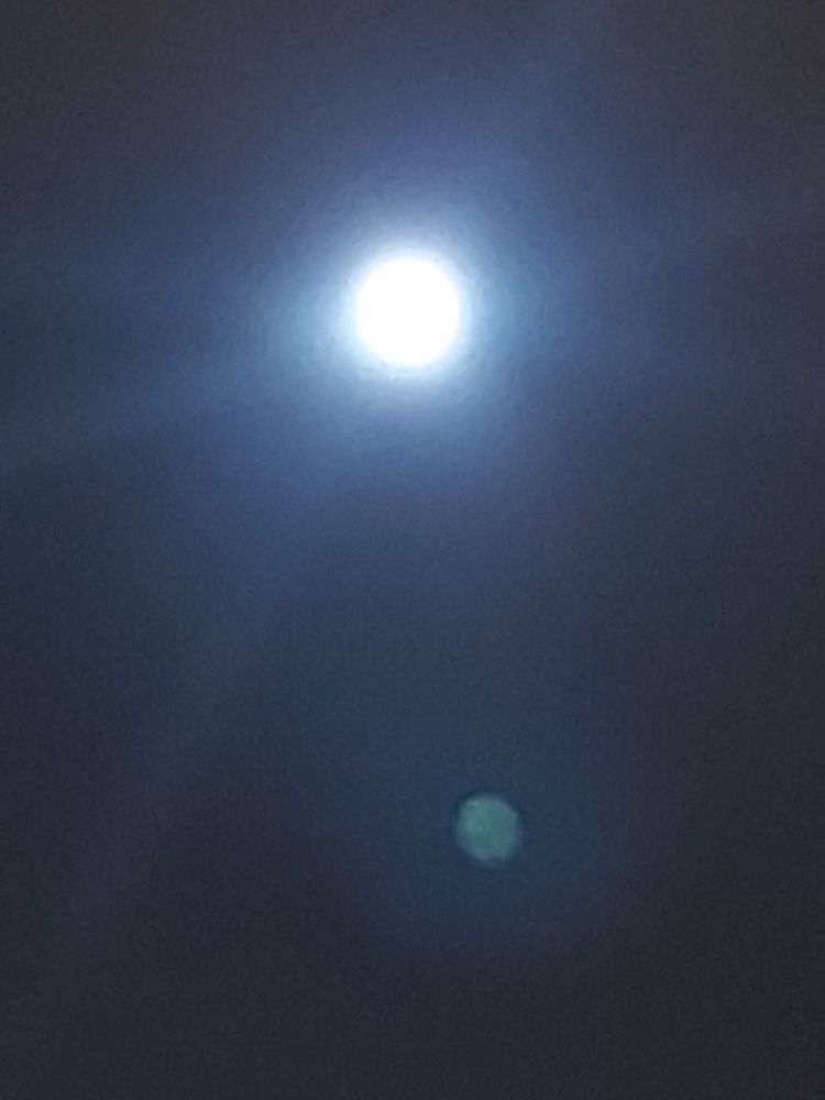 i attempted to take a good picture of the moon tonight but it barely captured any detail and basically looks like a white orb 😭