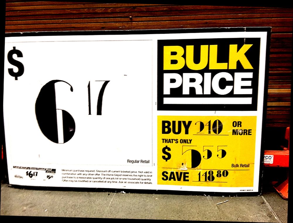 Elegant price sign in Sharpie reading "6¹⁷"; more digits have been made in a yellow panel to the side

The letters have intense shading character of a Didone like form, with very wide verticals, very narrow horizontals, and elegant ball terminals. 