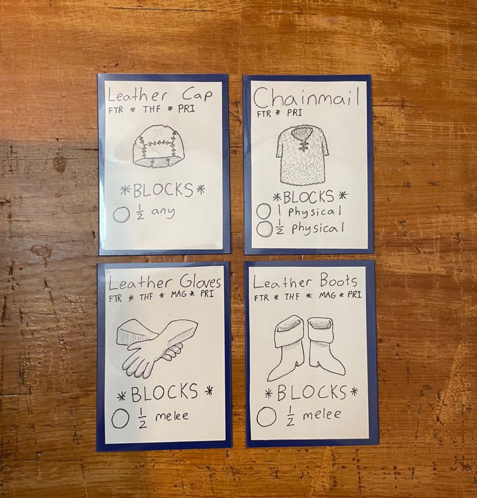 Four sample armor cards: leather cap, chain mail, leather gloves, and leather boots.