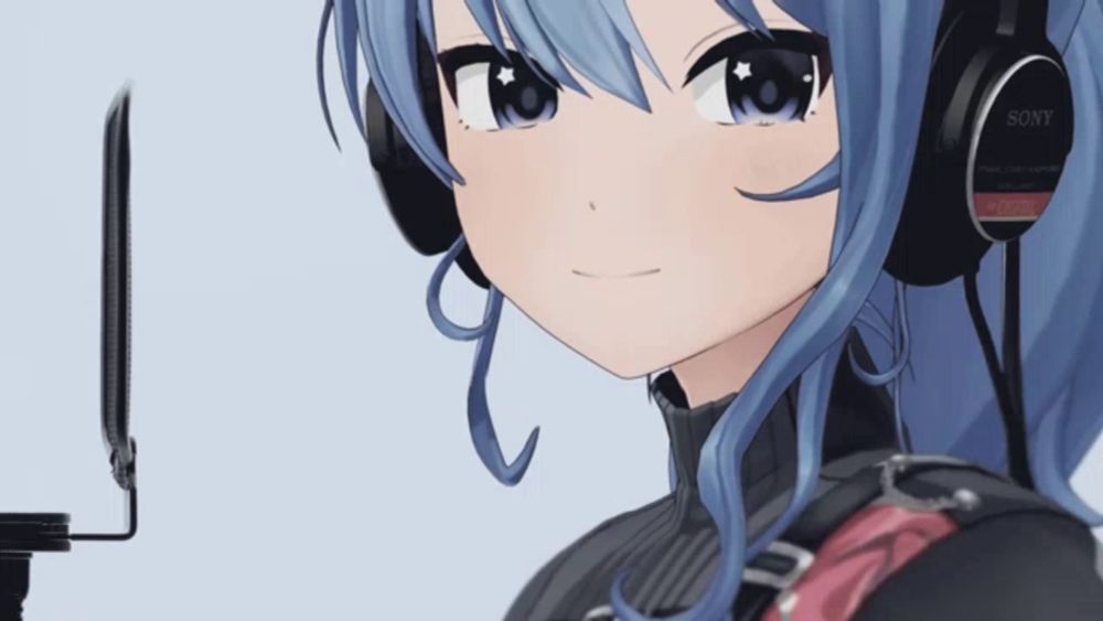 a close up of a girl wearing headphones with the word sony on them