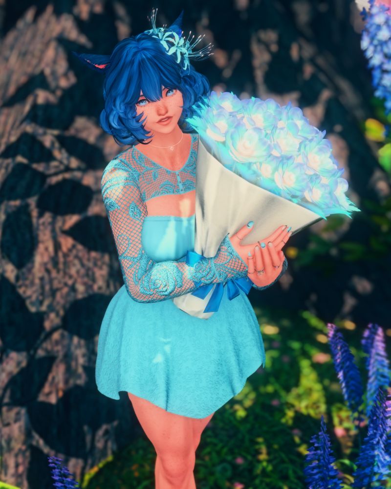 Keiko, a muscular female miqo’te, is wearing a short light blue dress with lace sleeves. She has a blue glowing spider lily in her hair and she is holding a bouquet of blue elpis flowers. She is looking up at the camera and smiling.
