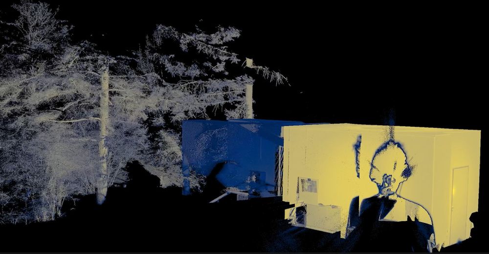 Colored laser scan of an office and the trees outside.