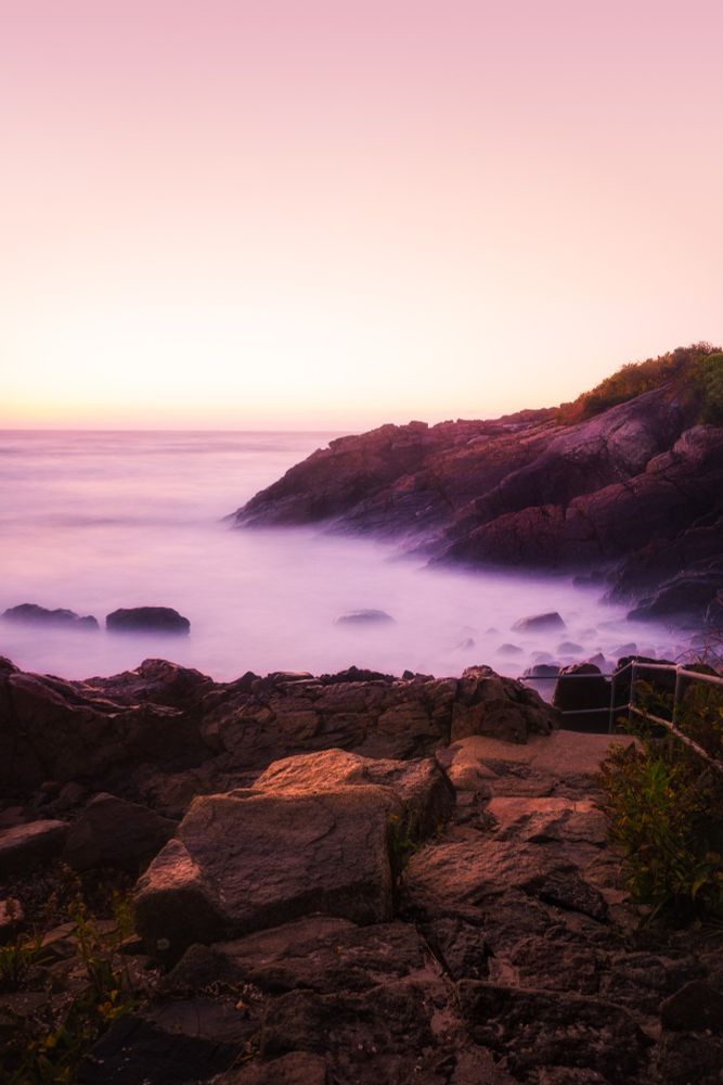 Long exposure photo taken just before sunrise of the coast and ocean. Ogunquit, ME 