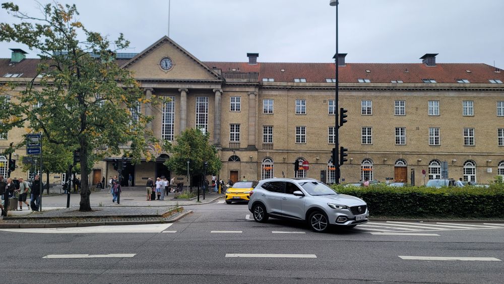 A photo of the front of the train station in Aarhus C, with a familiar-to-Americans storefront.