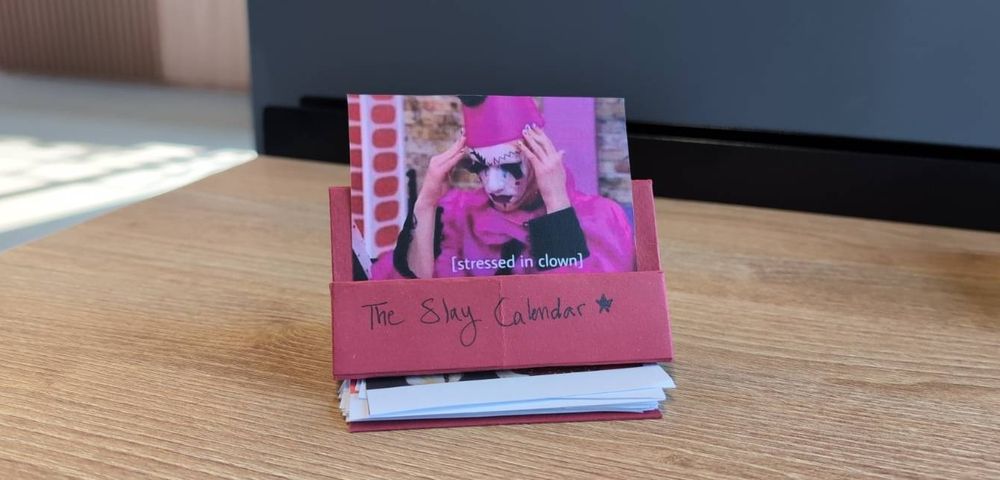 A calendar like cards on the table, that main one reading "stressed in clown"