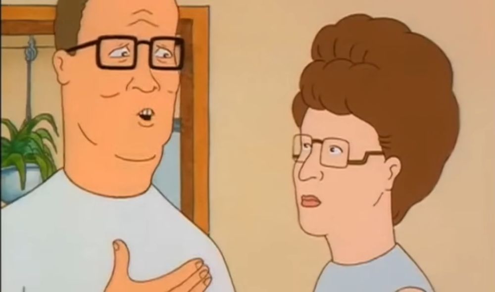 A screenshot from King of the Hill. Hank is talking to his wife, Peggy, as he says the words 