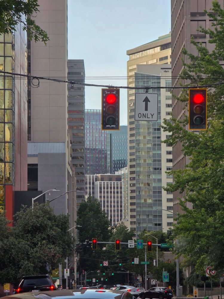 A straight shot looking down a long traffic laden street in Seattle, Washington